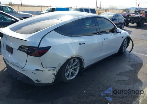 2021 Tesla Model Y Standard Range Rear-Wheel Drive from USA, damaged, VIN 5YJYGDED2MF103025